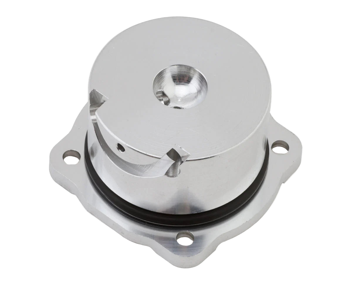 A silver-colored metal back plate for Nova Engines turbo engines.