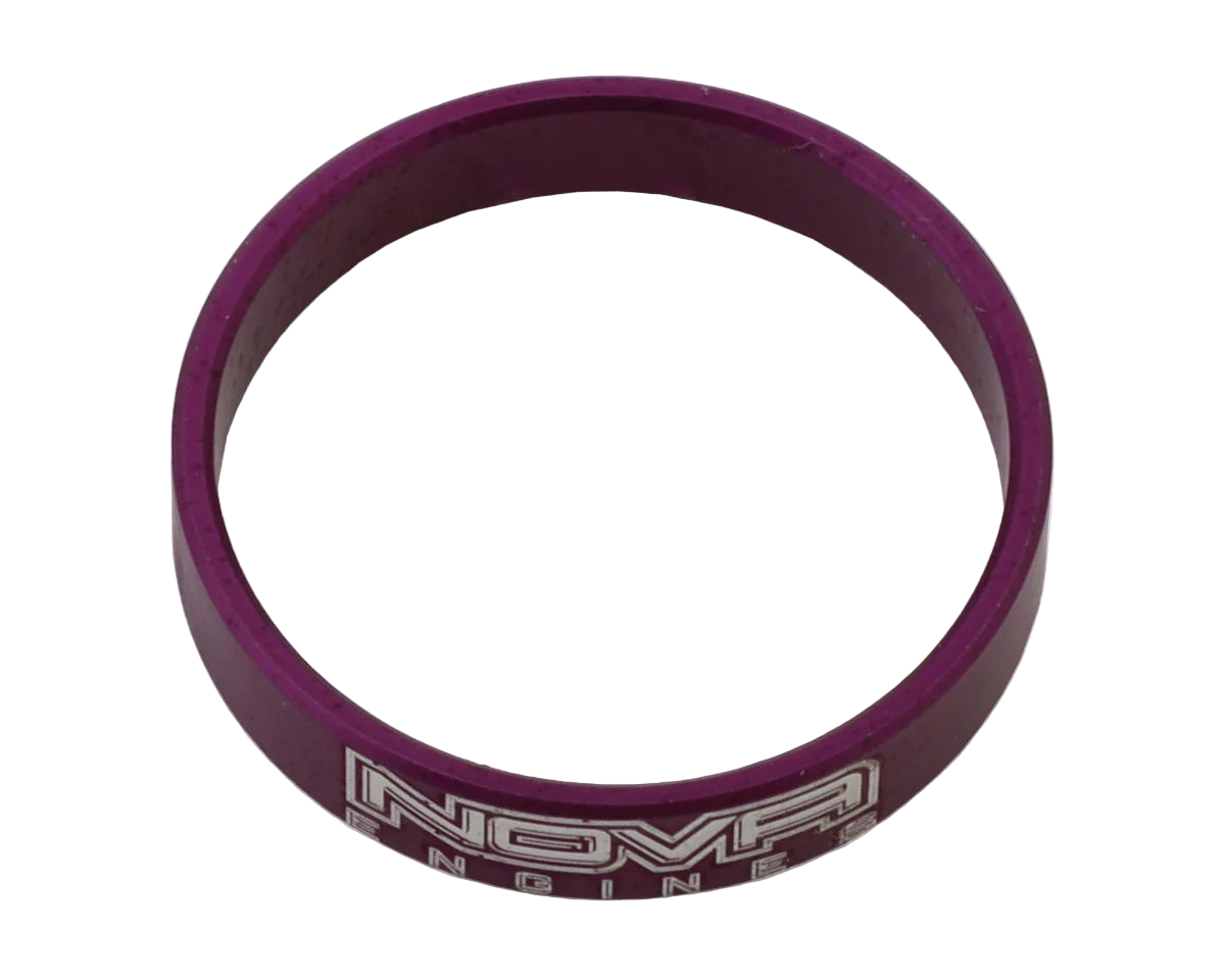A precision CNC-machined aluminum carb sealer collar with the branding 'NOVA ENGINES' on it, in purple color.