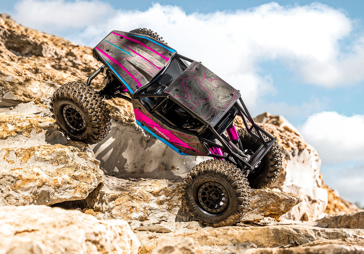 Pink TXC-4M crawling on rocks