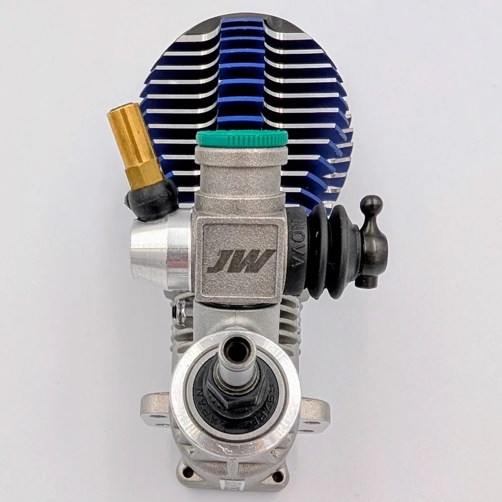 Side view of the JW slide carburetor mounted on a Traxxas engine, with numbered callouts