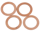 A set of copper head gasket shims of varying thicknesses.