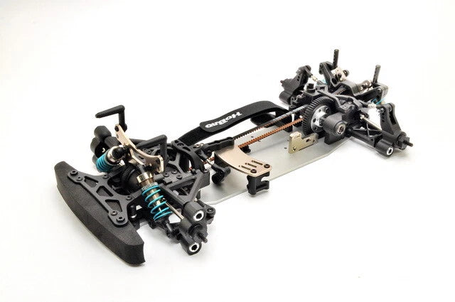 Black metal chassis of a remote control car on a white background